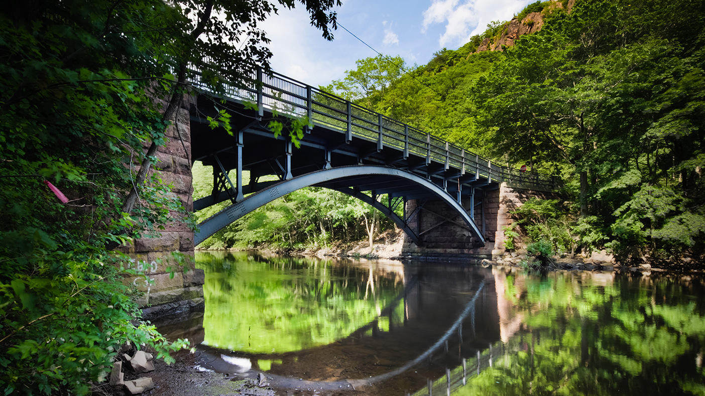 As identified during the inventory, we are designing the $1.3 million rehabilitation of the East Rock Road Bridge over the Mill River to maintain the area’s historic character.