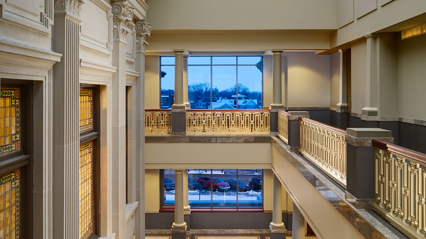 The addition provides shell space for future courtrooms along with a second floor guardrail that mimics the courthouse's original handrail design.