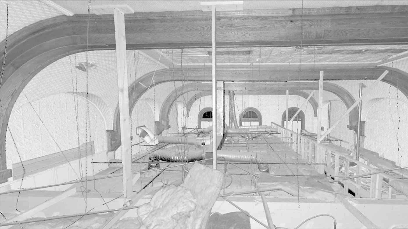Laser scans revealed the original ceiling, still intact under the suspended acoustical ceilings, included arched windows in a soaring space.