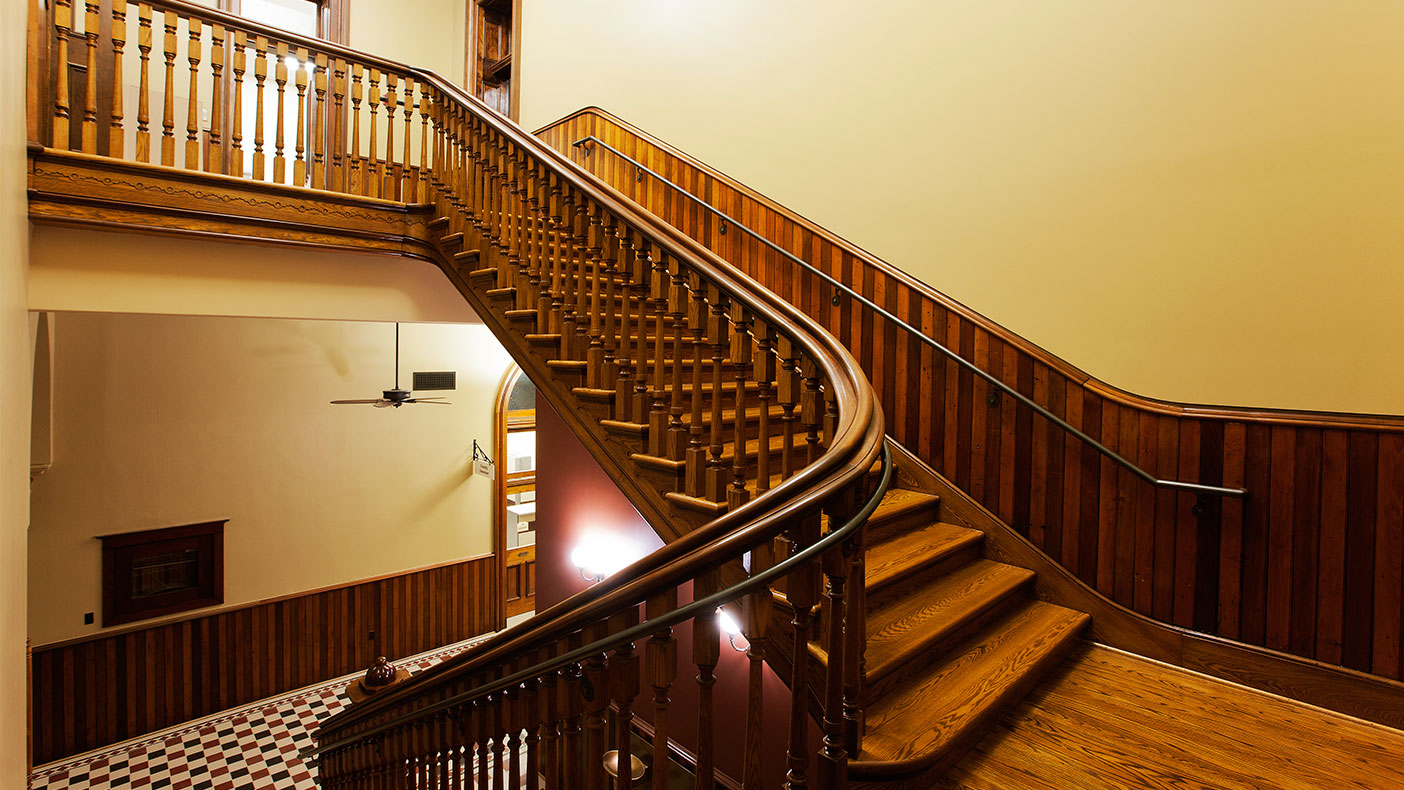 As part of the project, we restored the historic open wood staircases and remodeled the basement for modern office use. 