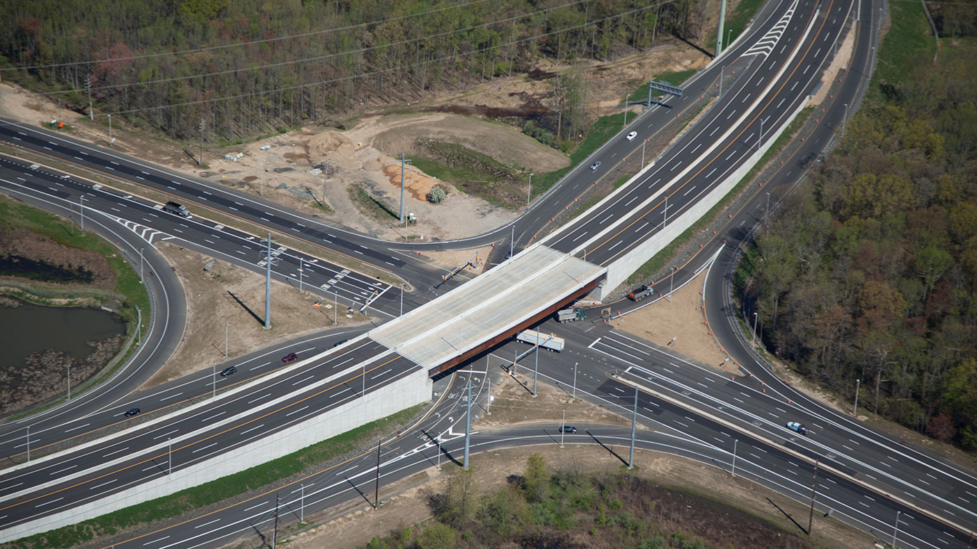 Our designers were challenged to design four two-span curved structures and a 257-foot, single-span curved bridge that accommodated New Jersey's first single point urban interchange (SPUI).