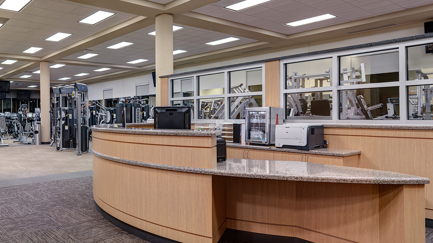 Program space on the main level includes a 5,500-square-foot fitness center, as well as locker and shower areas.
