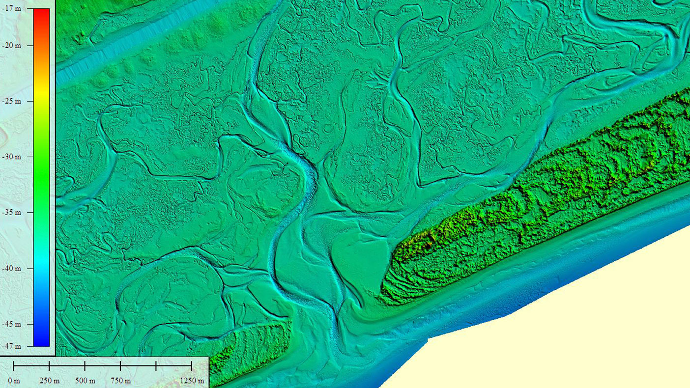 We developed a method using ECognition and ArcGIS to automate breakline definition of the land/water interface. An image of Bear Inlet, North Carolina, is color coded for elevation (ranging from -17 to -47m) based on an ellipsoid datum.