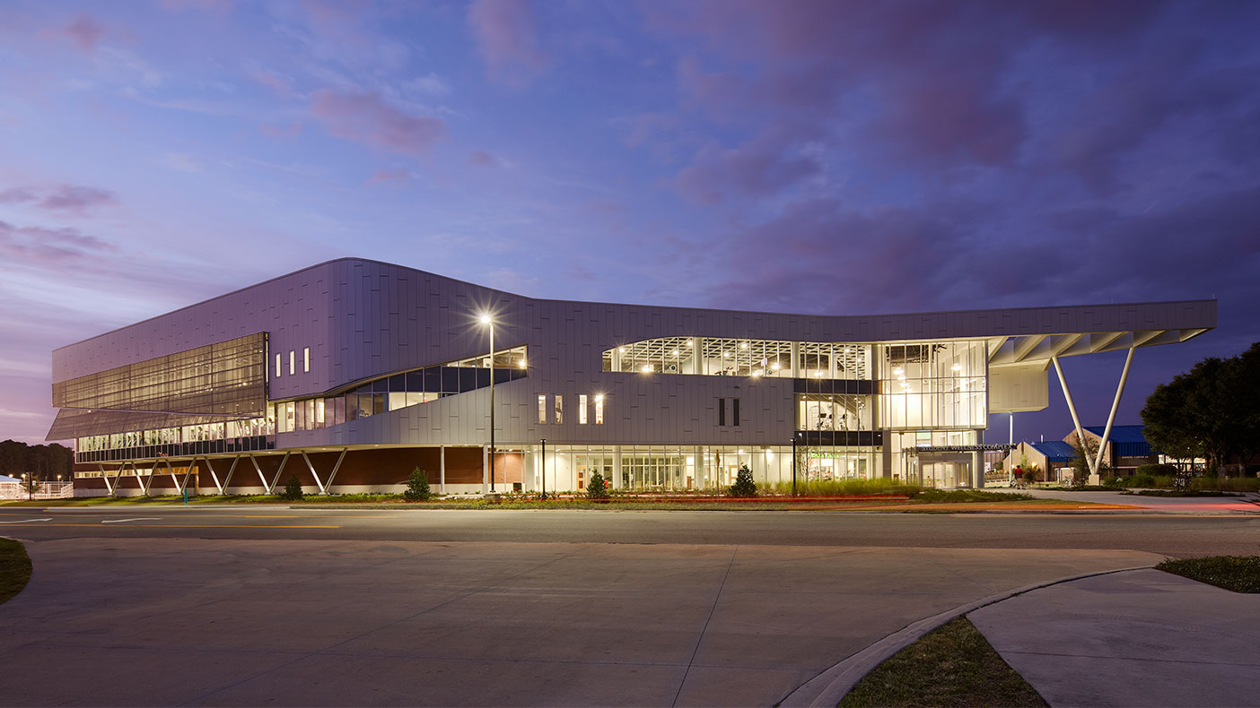 The exterior design incorporates a glazing pattern that symbolizes the university's osprey mascot.