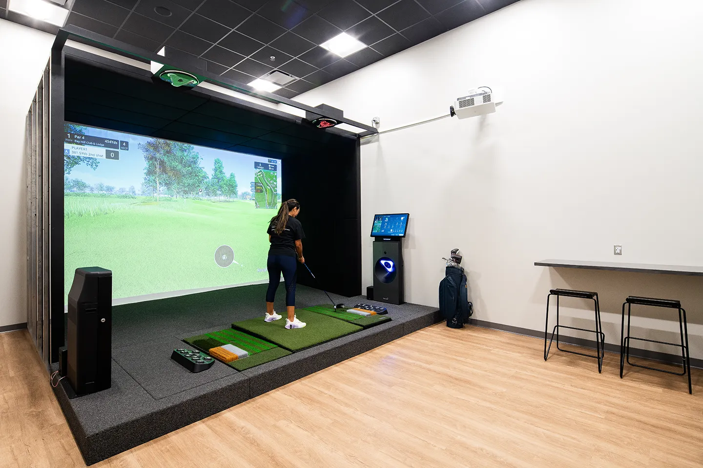 Two golf simulator bays offer additional space for creativity and competition.