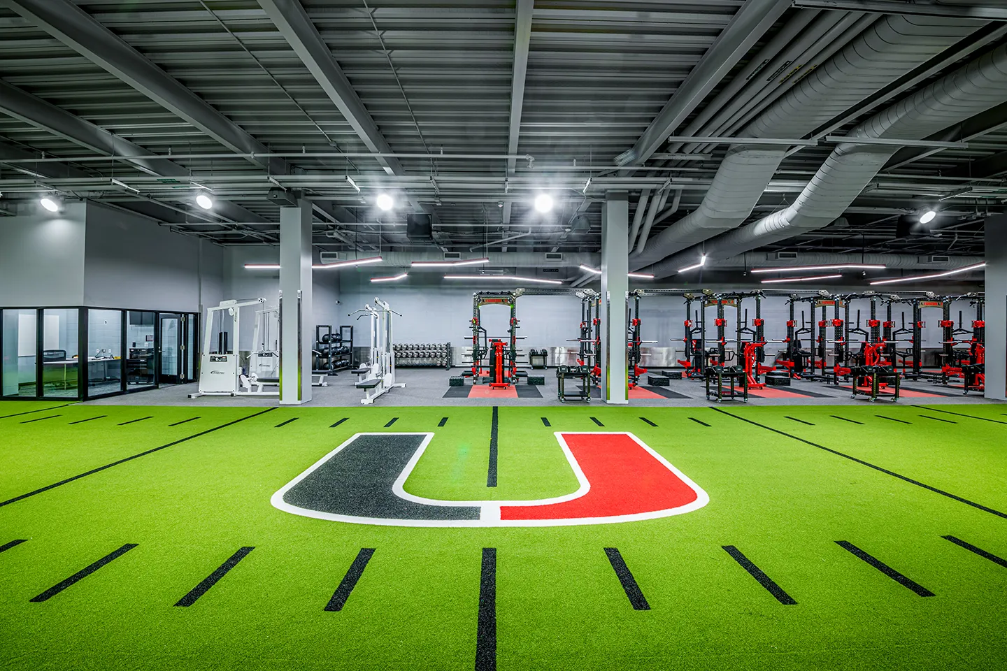 An expanded weight room, locker rooms, coaches’ offices, and a new space for the wrestling program were also included beneath the concourse area.